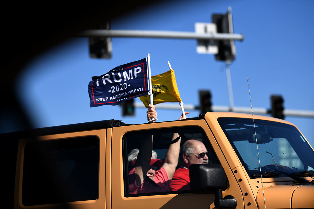 Trump supporters show off flags